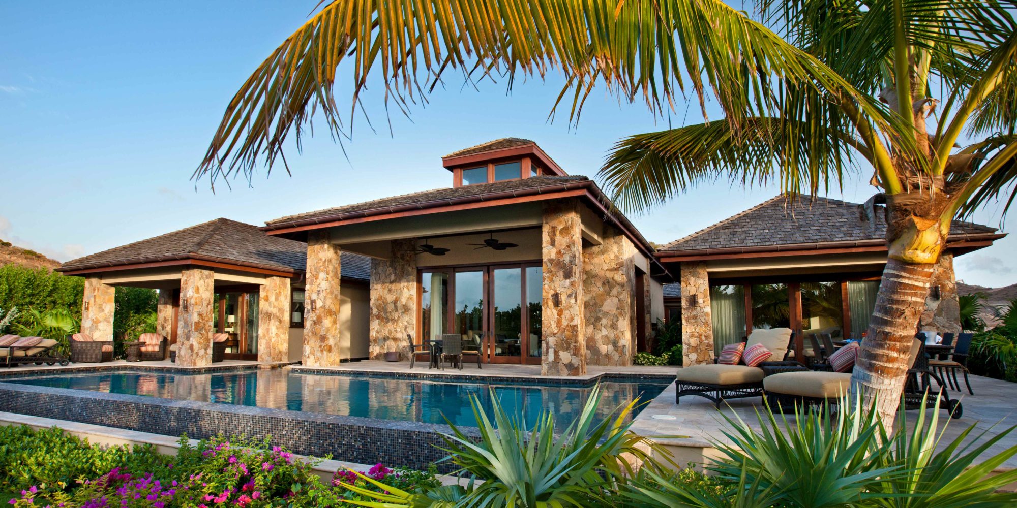 Virgin Island luxury home on the white sand beach of Oil Nut Bay is in the custom home portfolio of Chicago Interior Design Firm, Soucie Horner, Ltd.