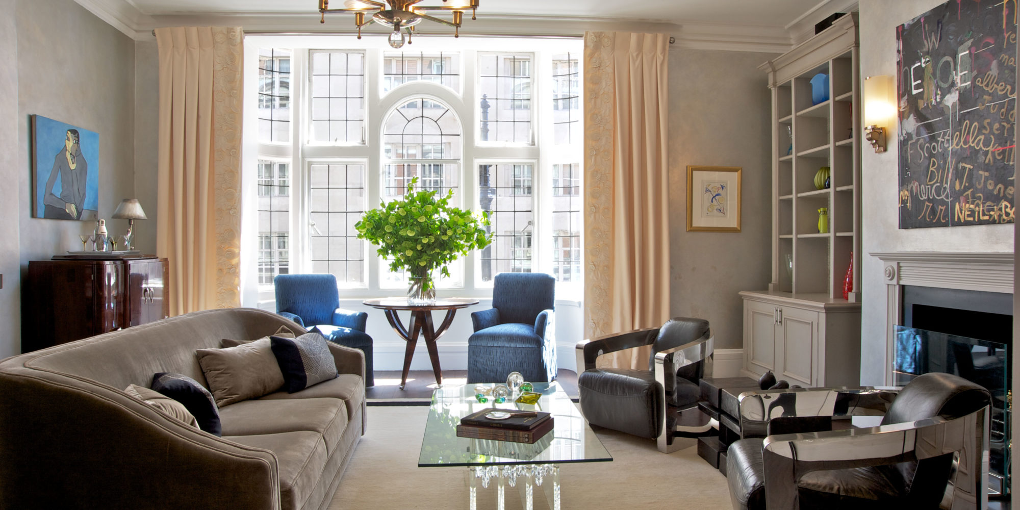 British Chic London Flat designed by Luxury Chicago Interior Designers, Soucie Horner, incorporates Ateliers Charlies Jouffre Custom Sofa, Space107 Cocktail Table, and French Art Deco Bar from Antiquities.