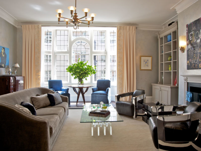 British Chic London Flat designed by Luxury Chicago Interior Designers, Soucie Horner, incorporates Ateliers Charlies Jouffre Custom Sofa, Space107 Cocktail Table, and French Art Deco Bar from Antiquities.