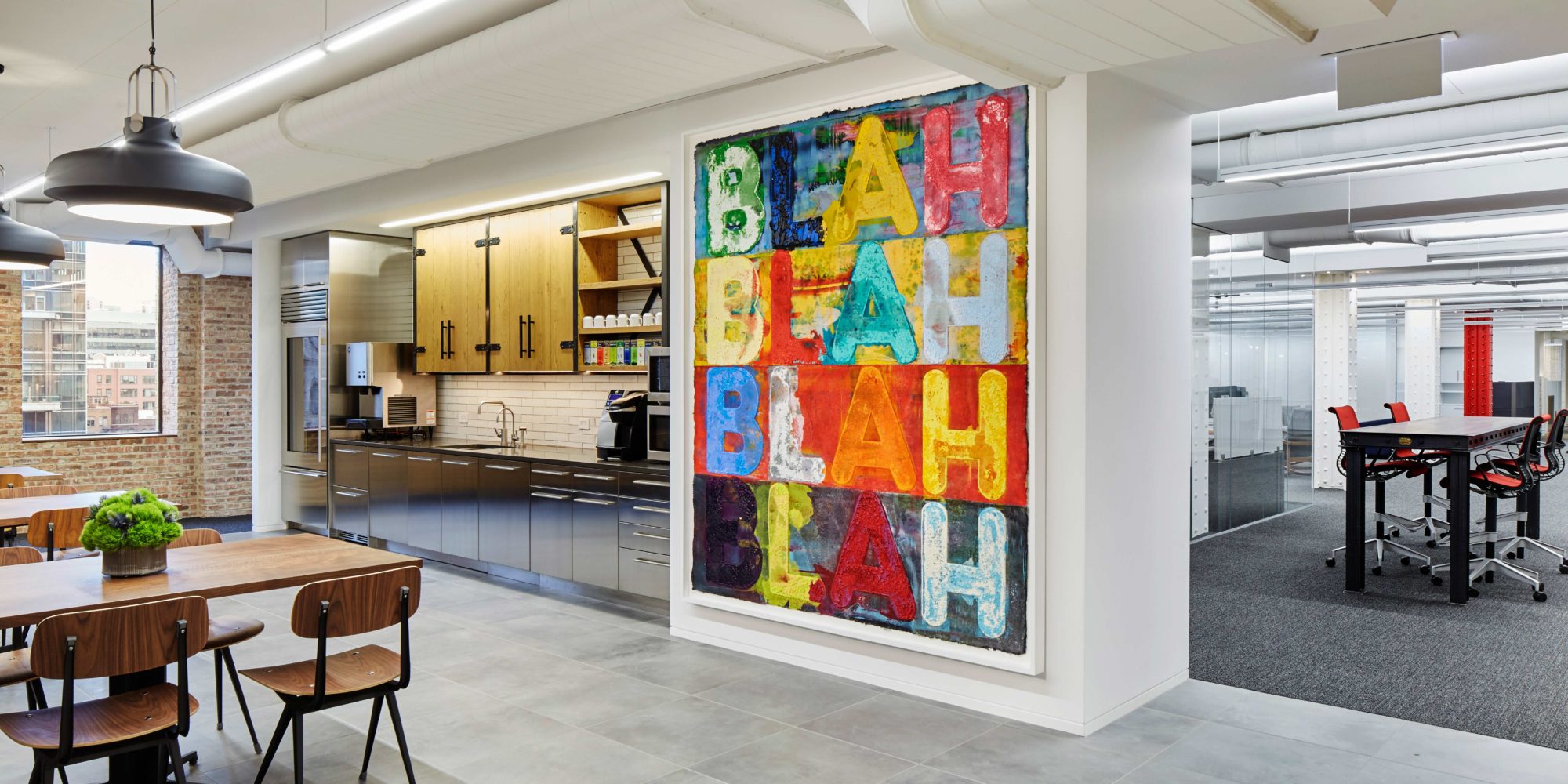 Chicago Office Space Transformed by Chicago Interior Designers - Soucie Horner, Ltd, incorporating Friso Kramer Chair from Inmod, Niche Pedestal Table from Chadhaus, and Copenhagen Pendant from Space Copenhagen.