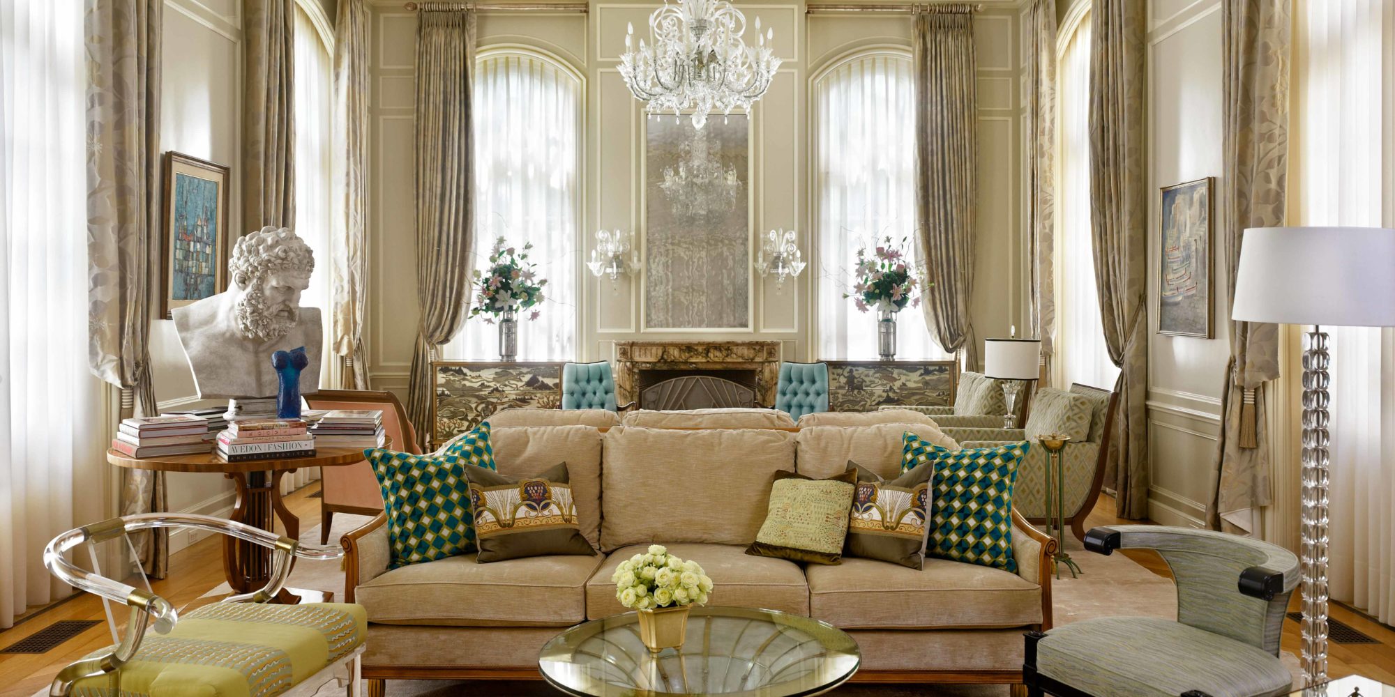 Beautifully Designed Living Room incorporates Italian Art Deco Sofa from William Switzer, Antique Cocktail Table from Epoca, One Ice Cube Floor Lamp from Porta Romana, and Lucite Throne from Charles Hollis Jones.