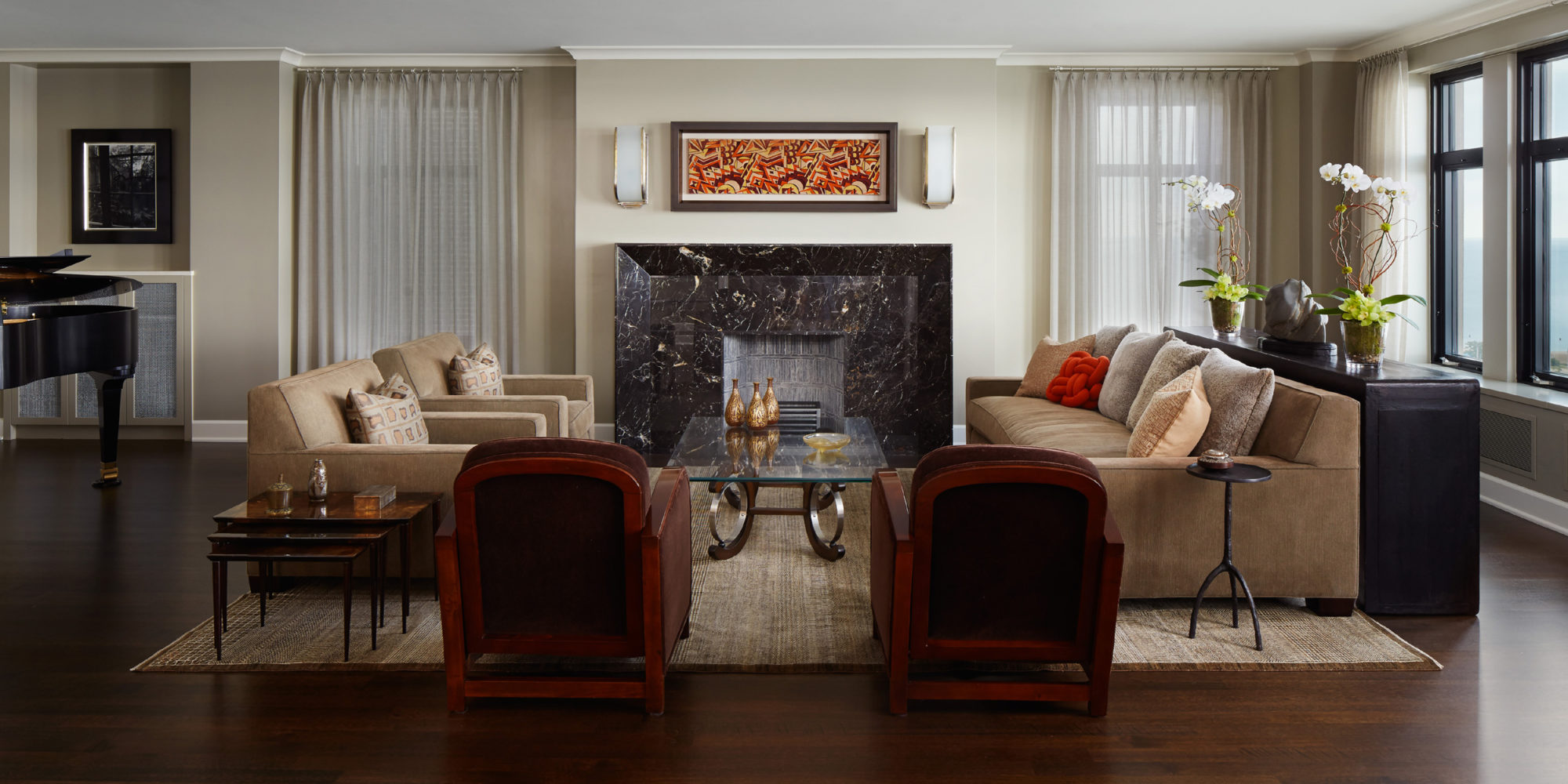 Mid Century and Art Deco Vibes take over in this alluring Living Room design, incorporating Area Rug from Orley Shabahang, and Art Deco Coffee Table.