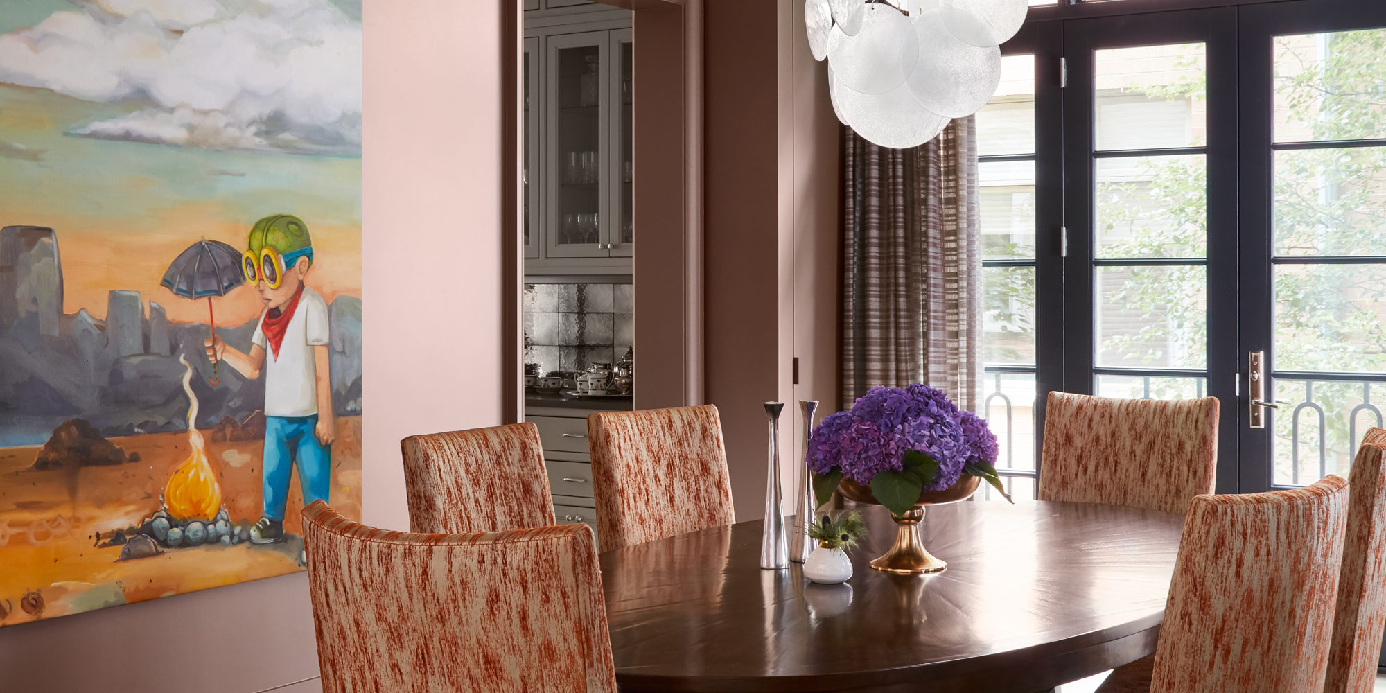 Feminine Dining Room incorporates A. Rudin Dining Chairs with Donghia upholstery, Grandfather Clock, and Specialty Painting