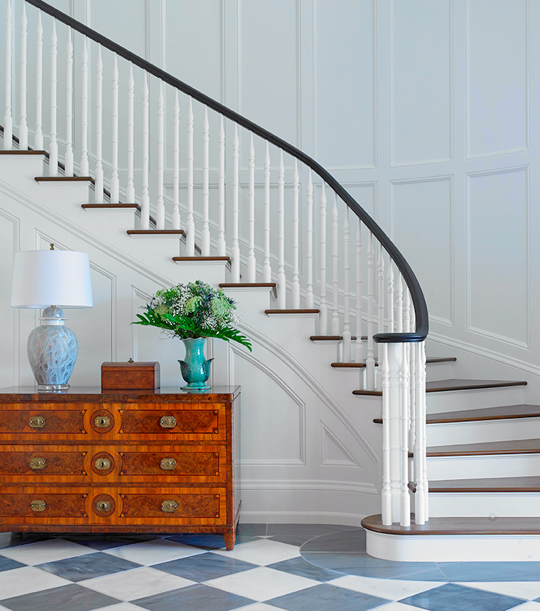 Bright and airy coastal modern Palm Beach foyer with antique chest of drawers by Olivier Fluery