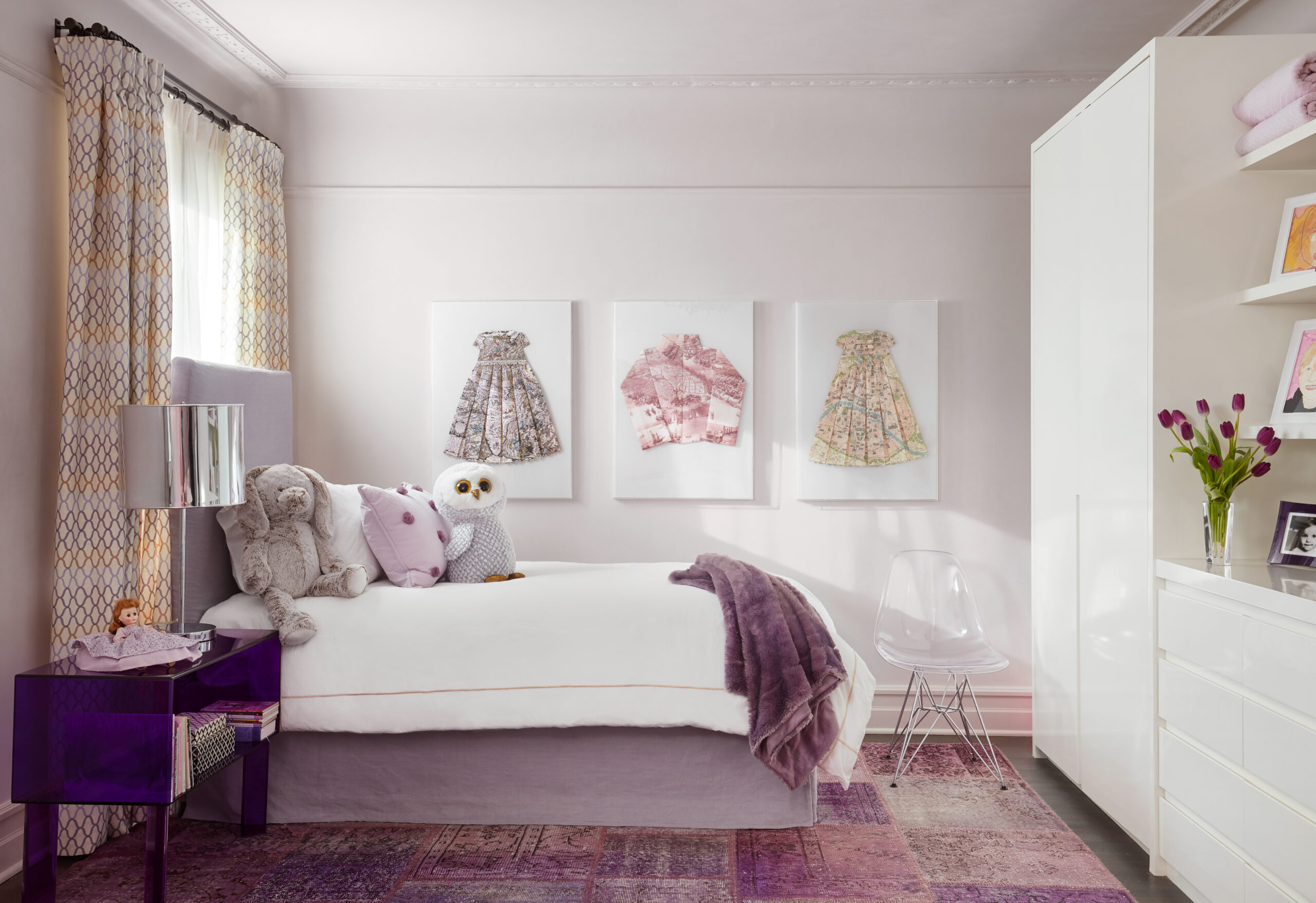 Bright and Lilac Girls Room incorporating Purple Acrylic Nightstands, Paper Dress Art, and Drapery by Laura Lienhard